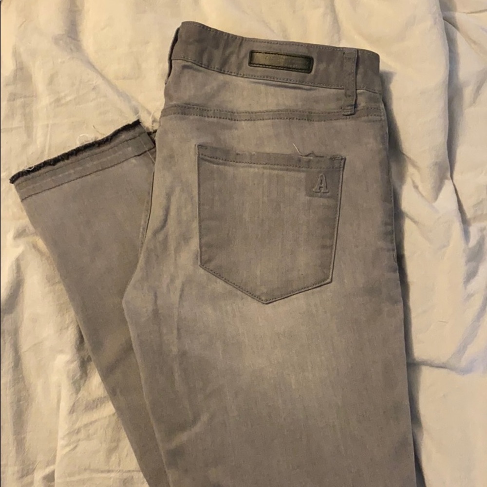 Distressed raw cuff gray jeans